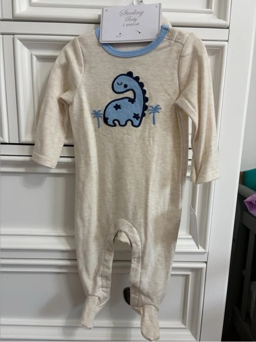Cream One-Piece with Blue Dino Applique